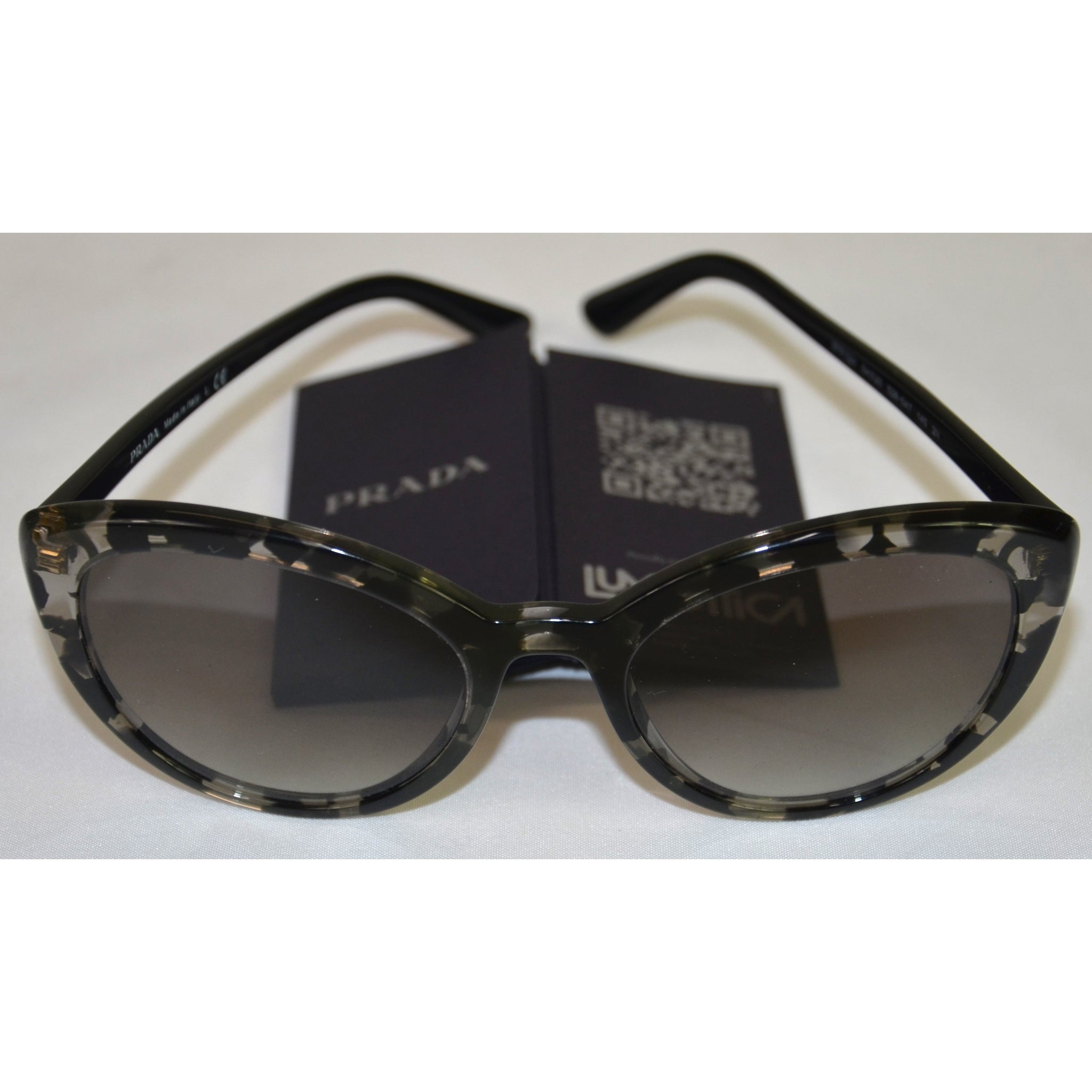 Prada Catwalk Sunglasses PR74VS (102) Amazon.com: Prada Catwalk PR 01VS 7S30A7 Ivory Plastic Cat  main image 4
